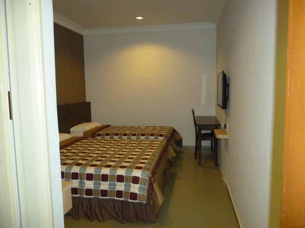 G Six Hotel Sitiawan Oda fotoğraf