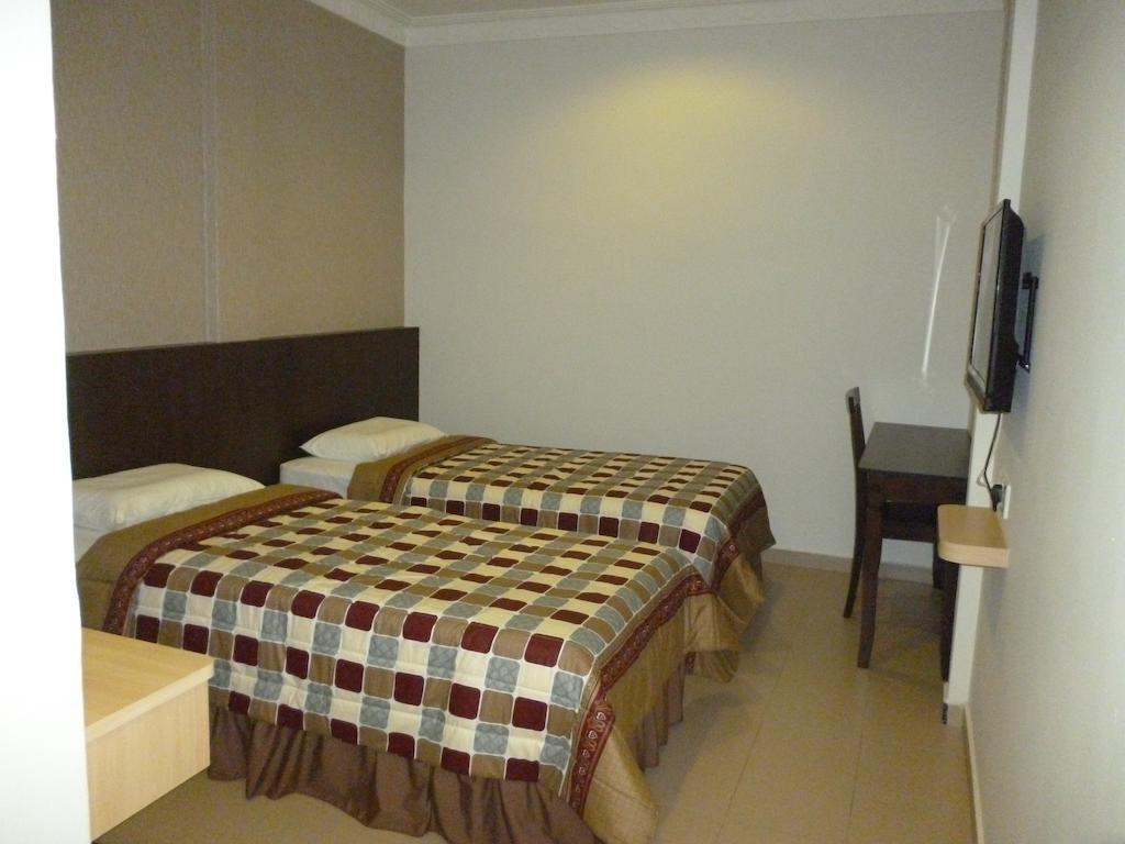 G Six Hotel Sitiawan Oda fotoğraf